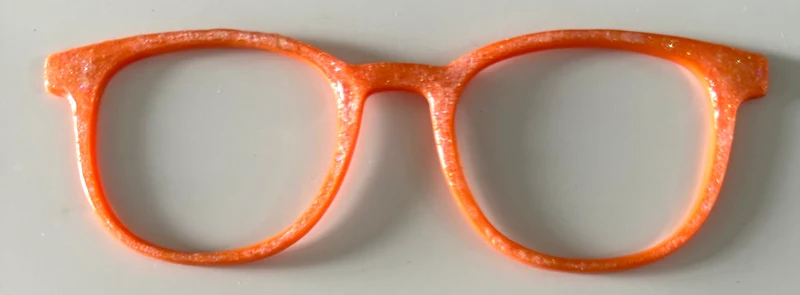 Reese Topper; orange glitter