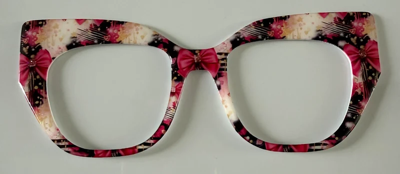 Murphy Topper; hybrid; Melissa’s Magnetic Marvels; pink/cream/black flowers and bows