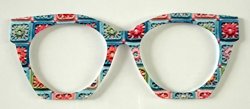 Zuri Case Topper; multicolored geometric pattern with flowers