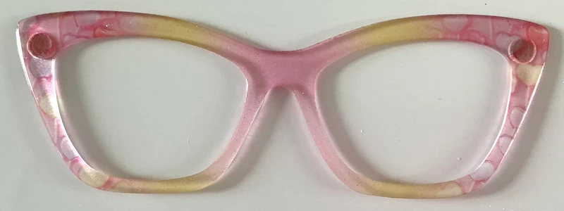 Wanda Topper; thick; semi-translucent-yellow and pink with hearts