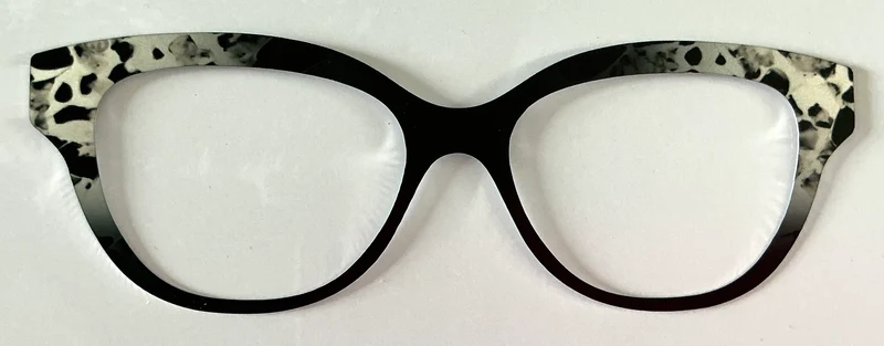 Quinn Topper; metal; black with silver tort in corners