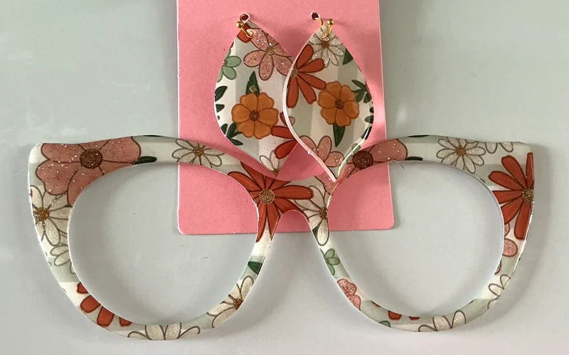 Zuri Topper; Creator; 60’s flower pattern with matching earrings
