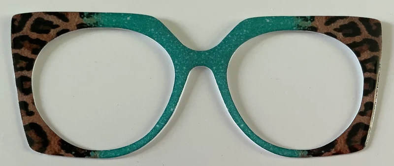 Zuri-BettyTopper; teal glitter/animal print vertical split