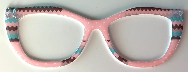 Wanda Topper; Creator; pink polka dots with brown and blue line accents and bow embellishments
