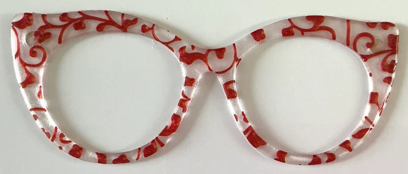Zuri Topper; Busy Busy; Creator; red swirls on frost