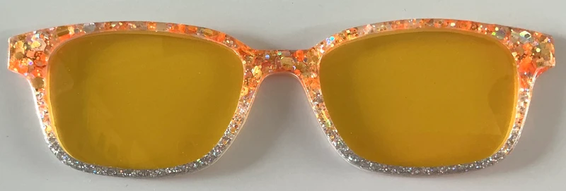 Finley Topper; orange and gray glitter with orange tinted lenses sun top