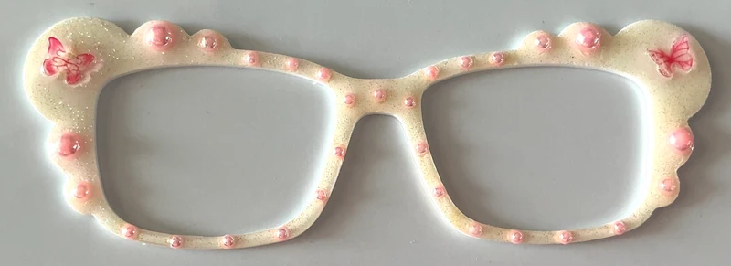 Kirby Topper; hybrid; cream with pink pearl and butterfly embellishments
