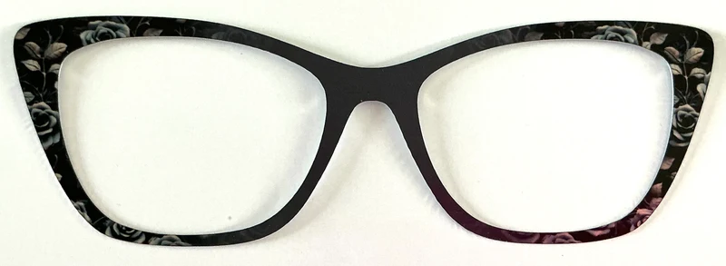 Wanda Topper; metal; black with roses on side