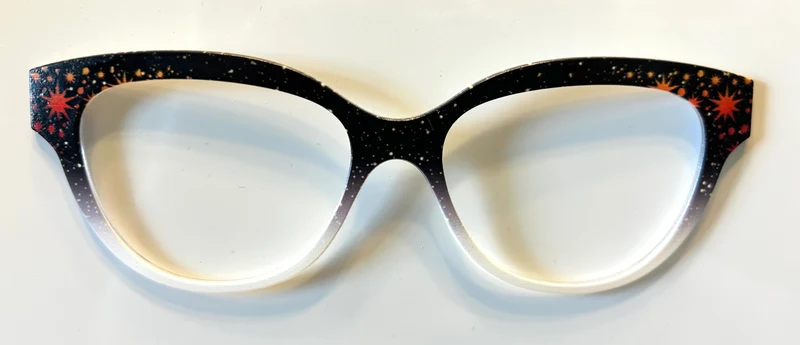 Quinn Topper; black to white gradient with orange stars in corners
