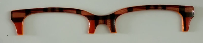 Larkin Brow Topper; orange and black plaid