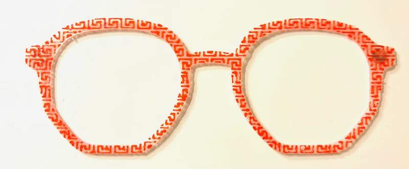 Rowan Topper; red/orange geometric pattern
