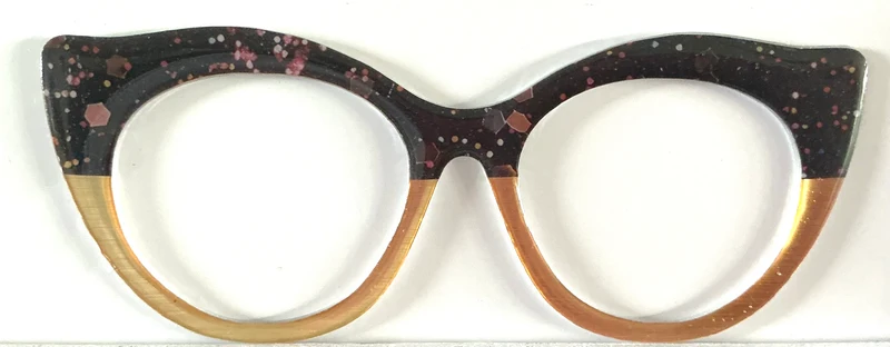 Zuri Topper; Creator; pink spotted design on black/gold split
