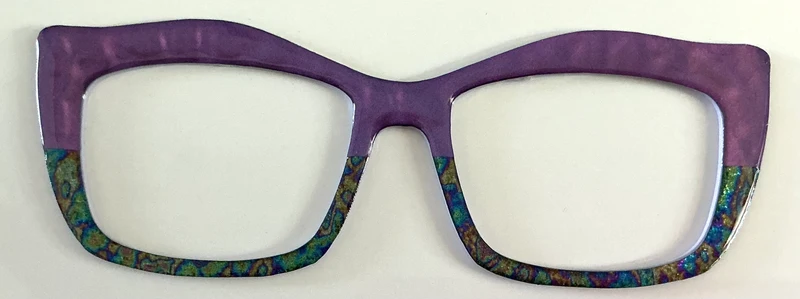 Kirby Topper; Creator; purple/blue green design split