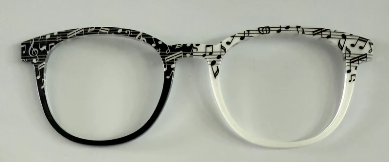PAIR Reese Topper; black and white music notes on staff