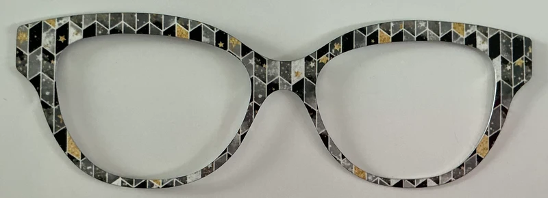 Quinn Topper; metal; black and gray patterned with gold stars