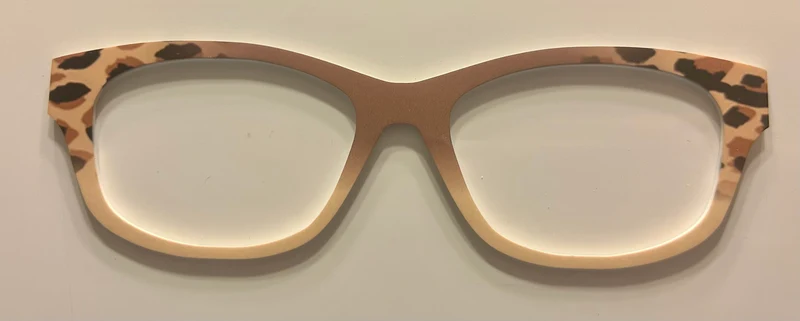 Addison Topper; brown/cream split; animal print in corners