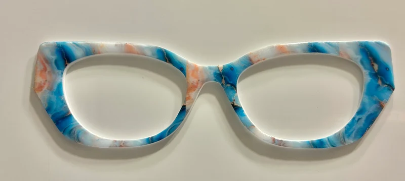 Ella Topper; Creator; peach, blue, and white marble pattern