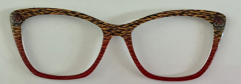 Wanda Topper; tiger stripes with faces in corners