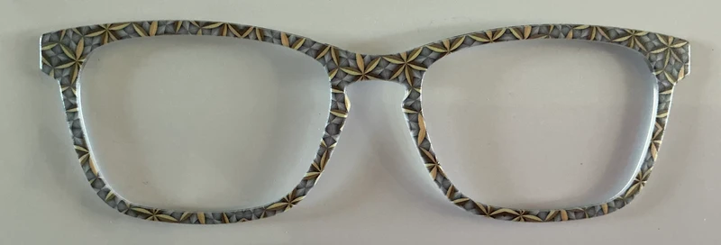 Casper Topper; gray and gold geometric pattern