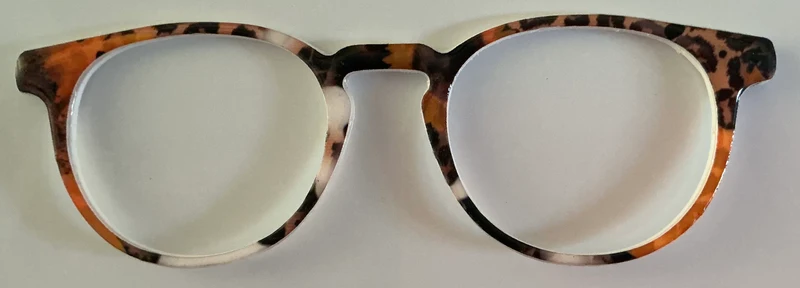 Soto Topper; orange,brown, and white animal print