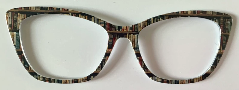 Wanda Topper; darkened bookshelves